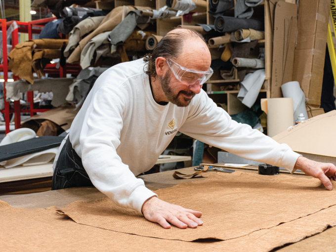 man working on custom furniture in toronto