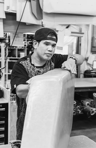 man upholstering custom made furniture in toronto