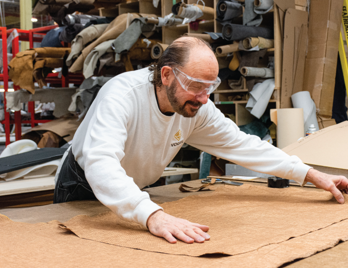 man working on custom furniture in toronto
