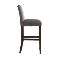 Side view of a 10101 traditional bar stool that has a pleated seat and curved back